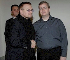 Rich Fisher with Bono in 2003